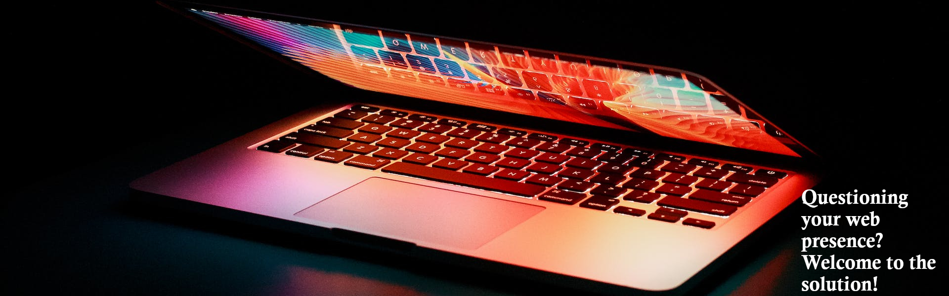 Picture of laptop with a caption of: Questioning your web presence? Welcome to Sleeping Giant web solutions.